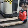 1852 Heli model CBD15J-L13 serial # 08015JFG607, 3300 lb. lifting capacity, 24 volt lithium ion powered pallet jack, 110 volt charger, Lift height 7.41", Weight 319 lbs., Year 2024